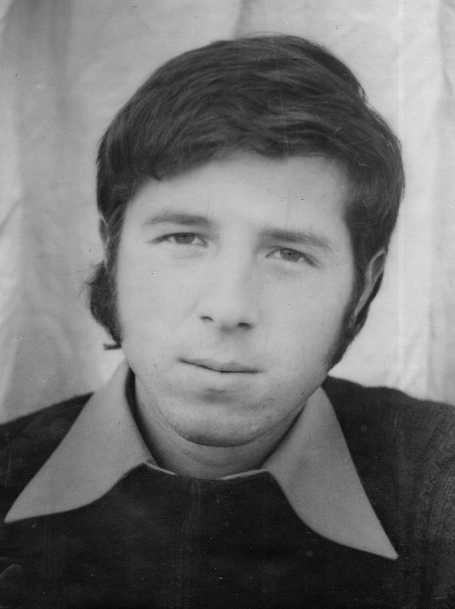 Original 1973 black-and-white studio portrait of my father at twenty-two
